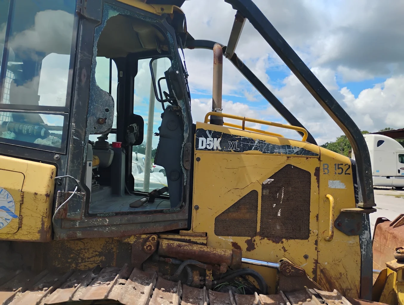 Used DSK XL excavator cab with open door showing operator seat and controls